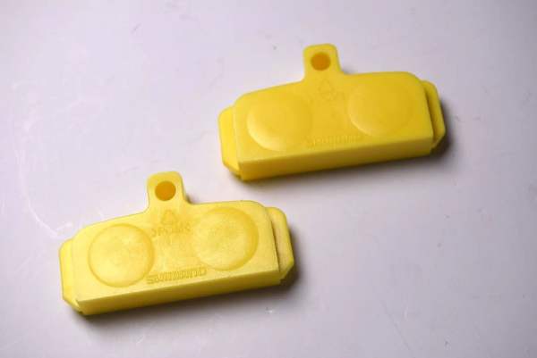 Shimano 2 x Shimano Abstandhalter gelb Blocker Y-8FF19000 für 4-Kolben Bremsen